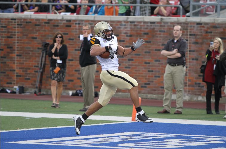 Army's Josh McNary returns an SMU fumble 55 yards for a touchdown in the 2010 Bell Helicopter Armed Forces Bowl. Photo by George Walker